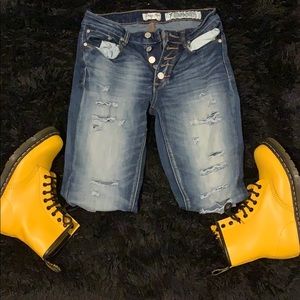 Ripped Mid Rise Faded Jeggings